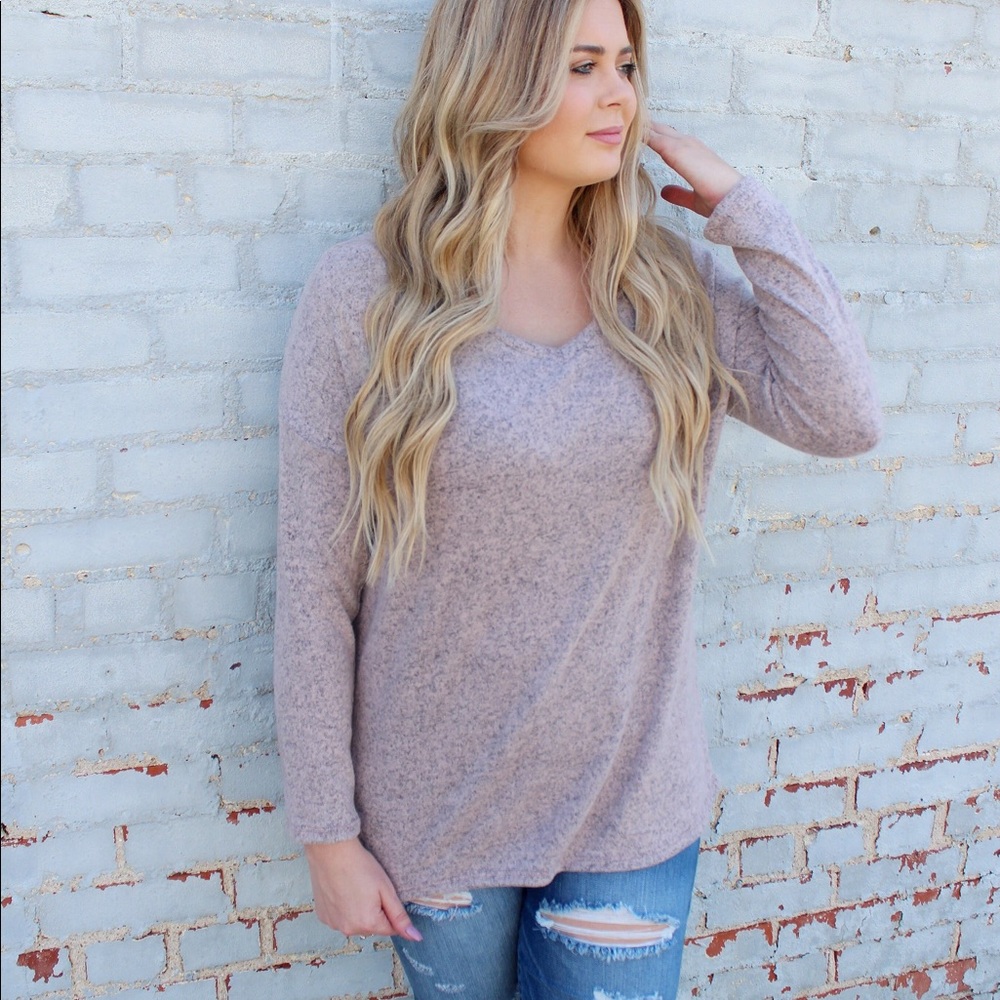 Pale pink sweater cut out back